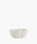 A smooth, matte white candle holder in floral shape. | SW Home