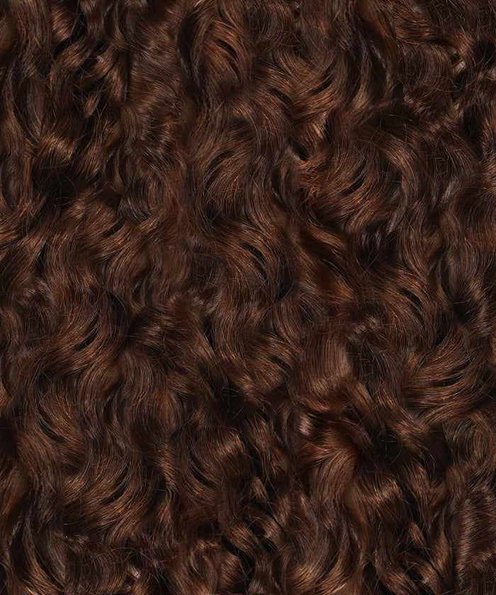 Close-up of thick, shiny, tight ringlets in natural black , filling the frame—ideal for showcasing Perfect Locks Curly Fusion I-Tip Hair extensions.#color_chocolate-brown-(3)