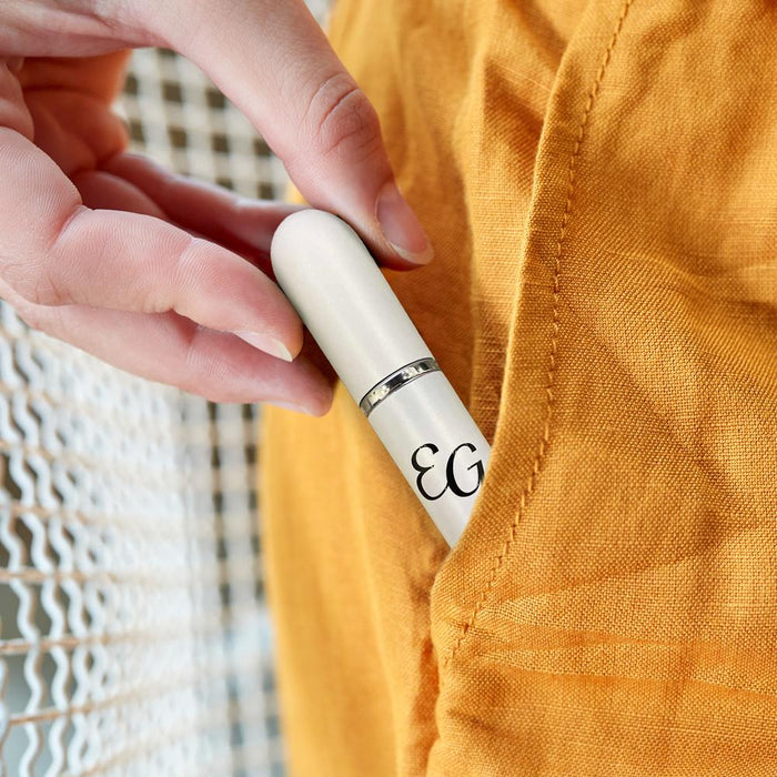 Lifestyle image of woman holding the Essential Oil Inhaler by Edens Garden