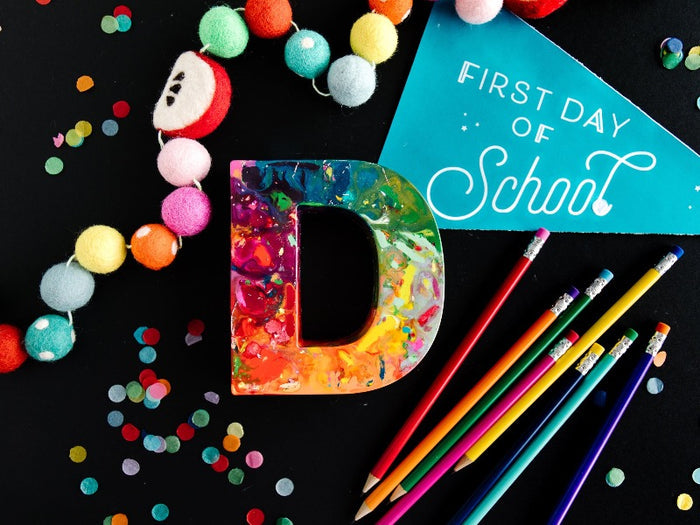 Oversized crayons in the shape of giant letters. This is a giant letter D that has rainbow colors in ROYGBIV order.  First day of school gift for kids or teacher gift idea.