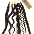 Six strands of dark brown Perfect Locks™ Hair Texture Ring extensions, from straight to tight curls, are shown. A tan Perfect Locks tag is in the upper right corner.