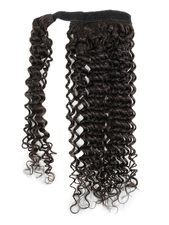 A luxurious clip-in hair extension featuring long, dark brown, tightly curled strands with a secure black band at the top for easy styling.
