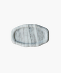 Oval marble tray with gray and white striations, featuring a smooth, polished surface. The elegant design conveys a sense of luxury and simplicity. | SW Home